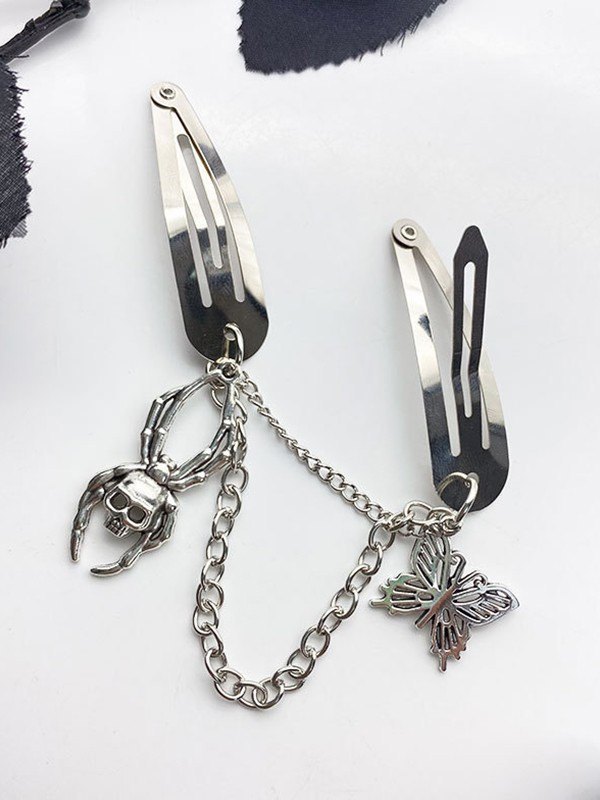 Broche para el cabello con dije de mariposa y calavera-3